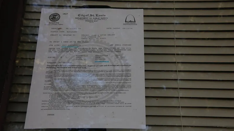 Building permit notice posted on a house