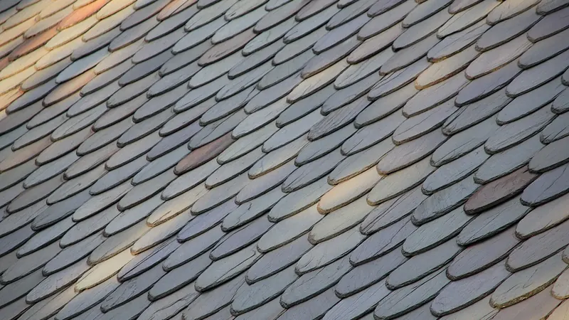 Close-up of a slate roof laid in overlapping rows